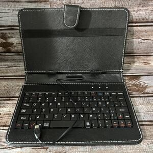 Tablet case and Keyboard. Can hold up to a 9” tablet.